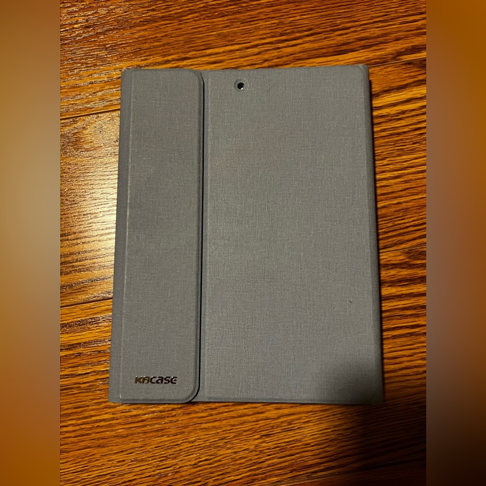 Blue IPad case with Bluetooth keyboard